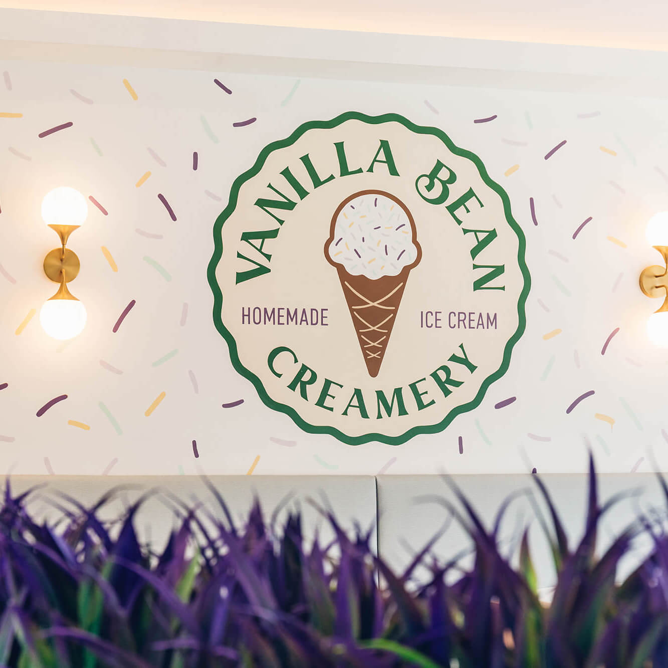 vanilla bean creamery interior logo on the wall